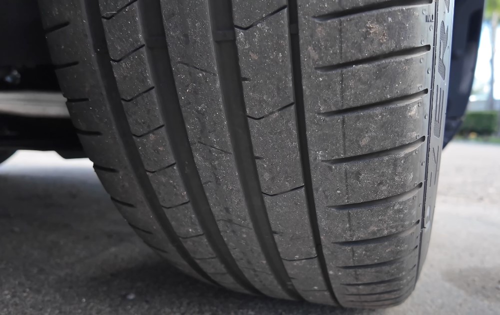 A close up photo of a 275 tire