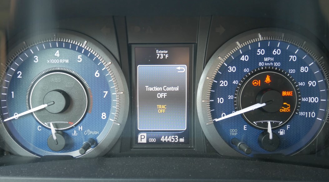 Traction control off written on a dashboard