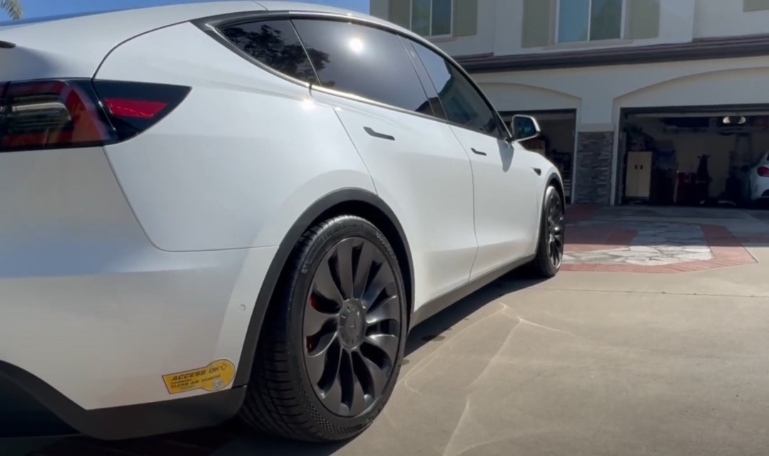 Parked white Tesla Model Y