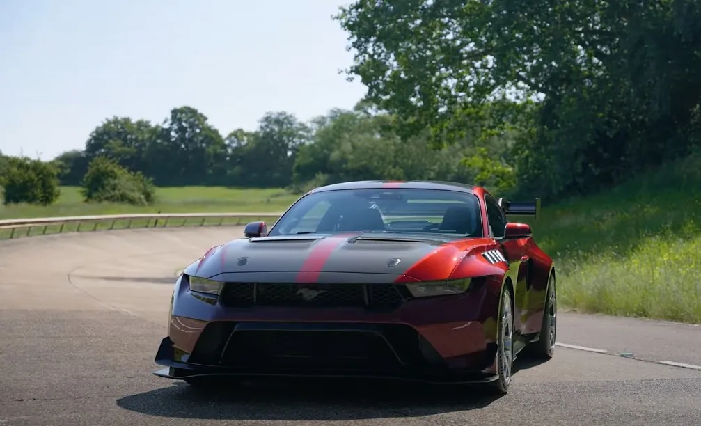 Black and red Ford Mustang GTD parked on the road