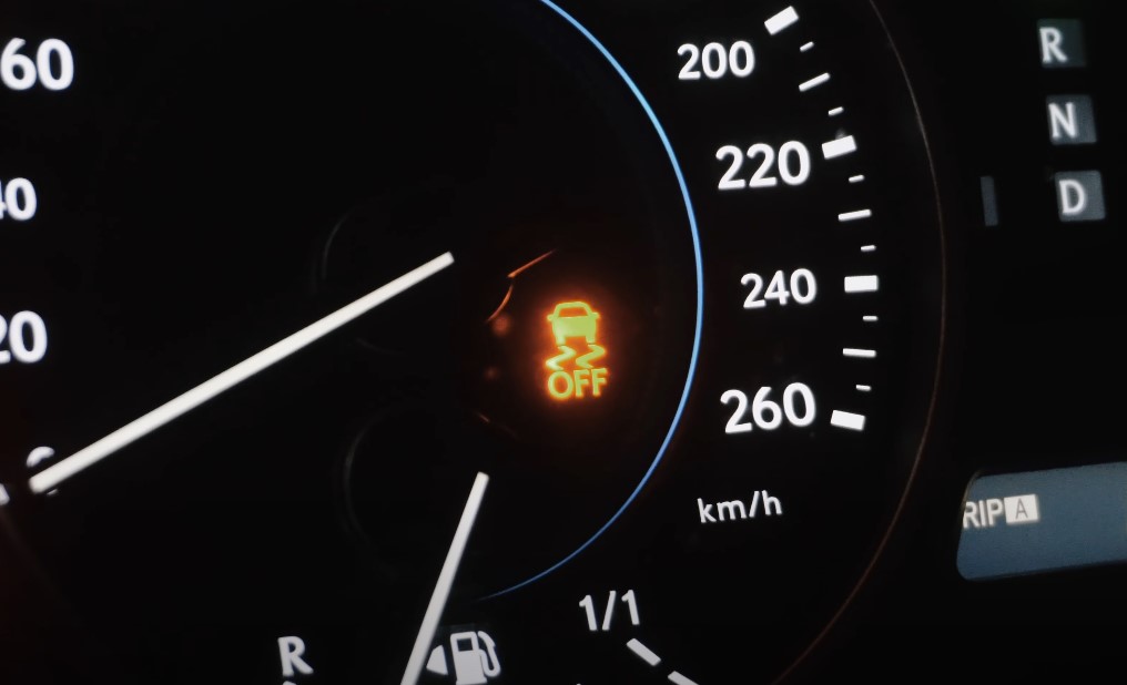 Traction control light on a dashboard turned on 