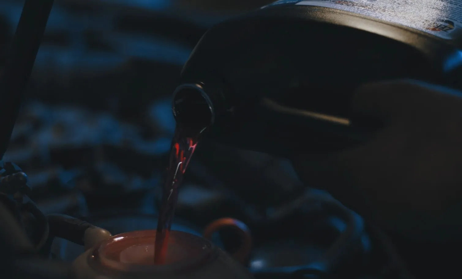 Dark photo of a car coolant liquid