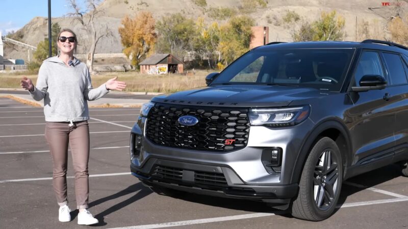 2025 Ford Explorer, showcasing its stylish front grille and sleek body design in a parking lot