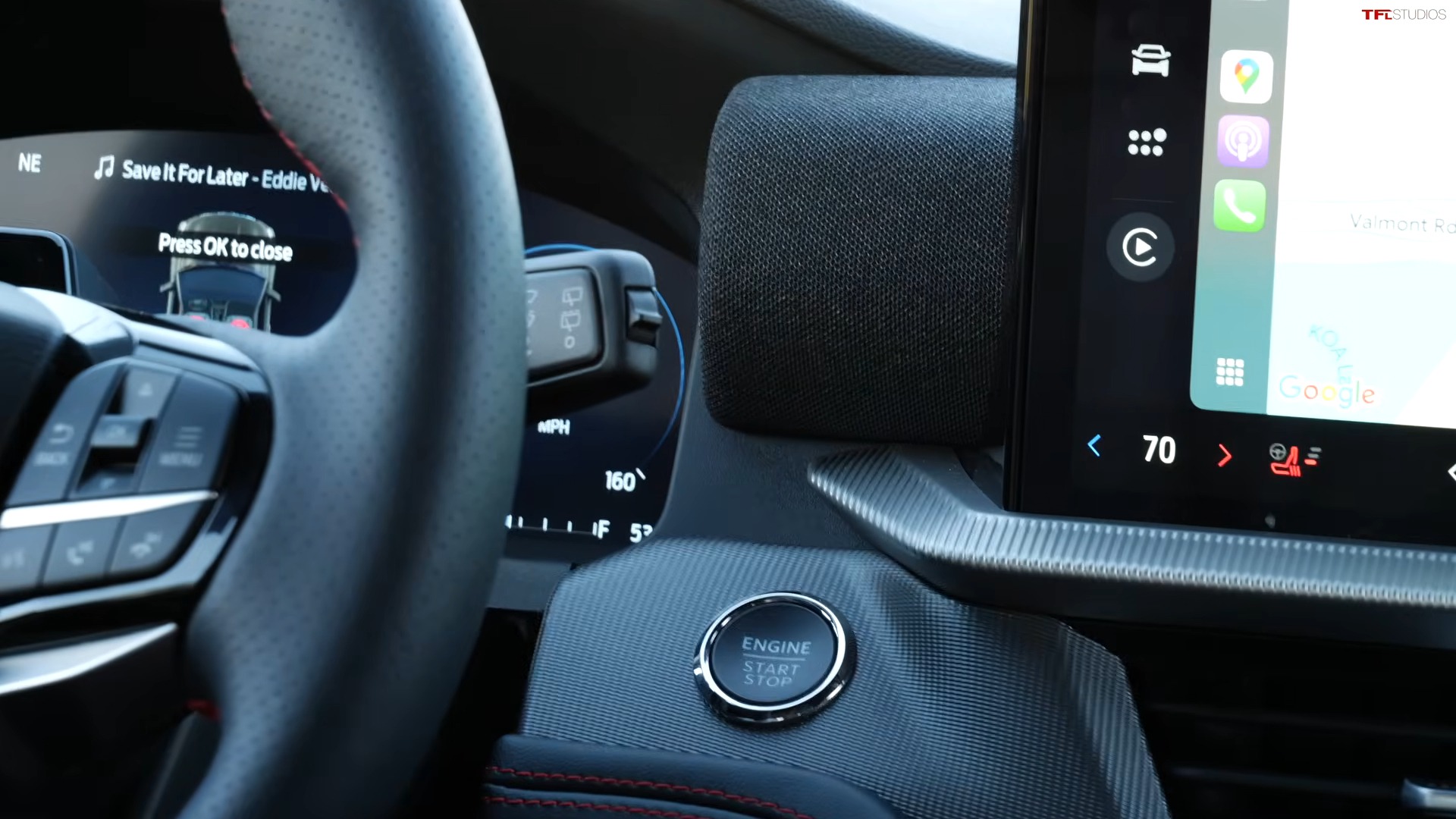 Dashboard in a 2025 Ford Explorer, highlighting the engine start/stop button and infotainment system display