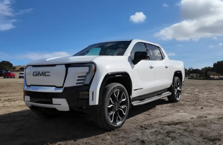 White Sierra EV truck parked outdoors