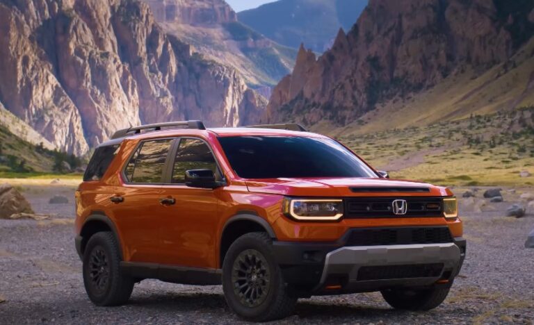 2026 Honda Passport parked on the road in canyon