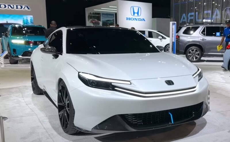 White Honda Prelude in a showroom