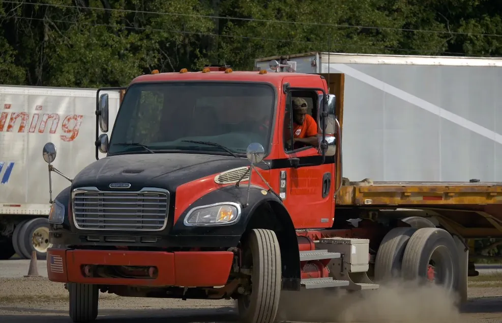 Man in a truck driving school