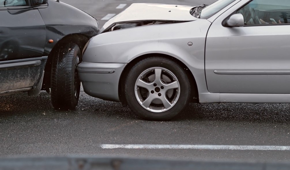 Two cars crashing on the street