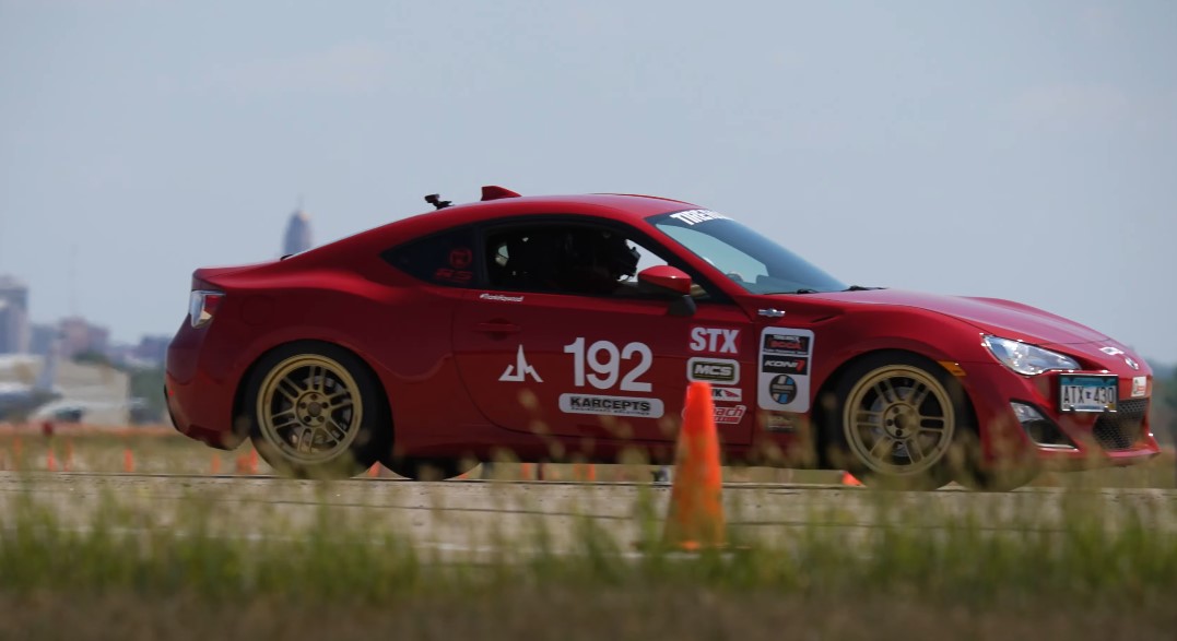 Red Improved Touring SCCA doing road tests