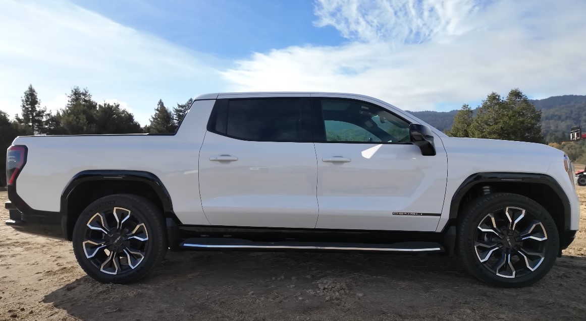 Side profile of a white Sierra EV truck