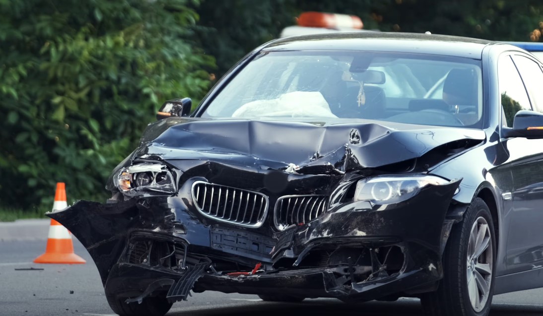 Car crashed with front part completely crushed