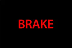 Red warning light saying "Brake"