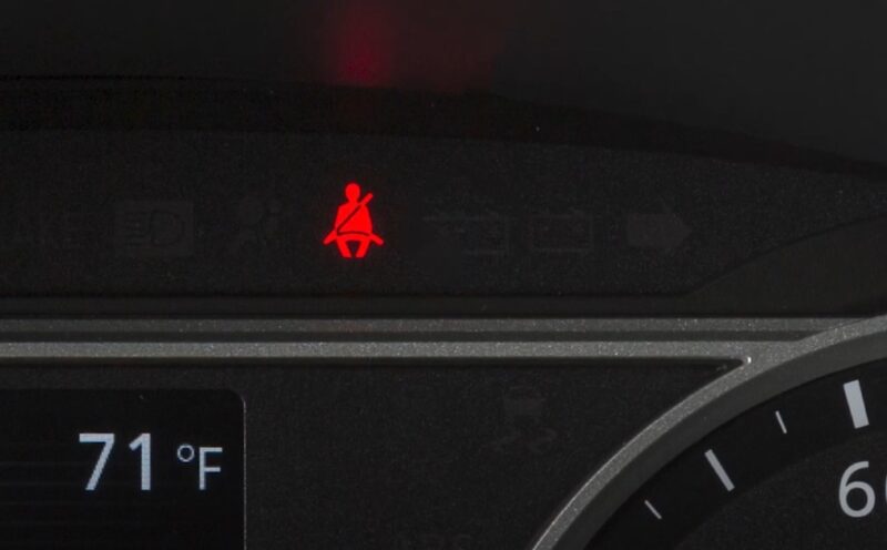 Seat belt warning on a gauge cluster