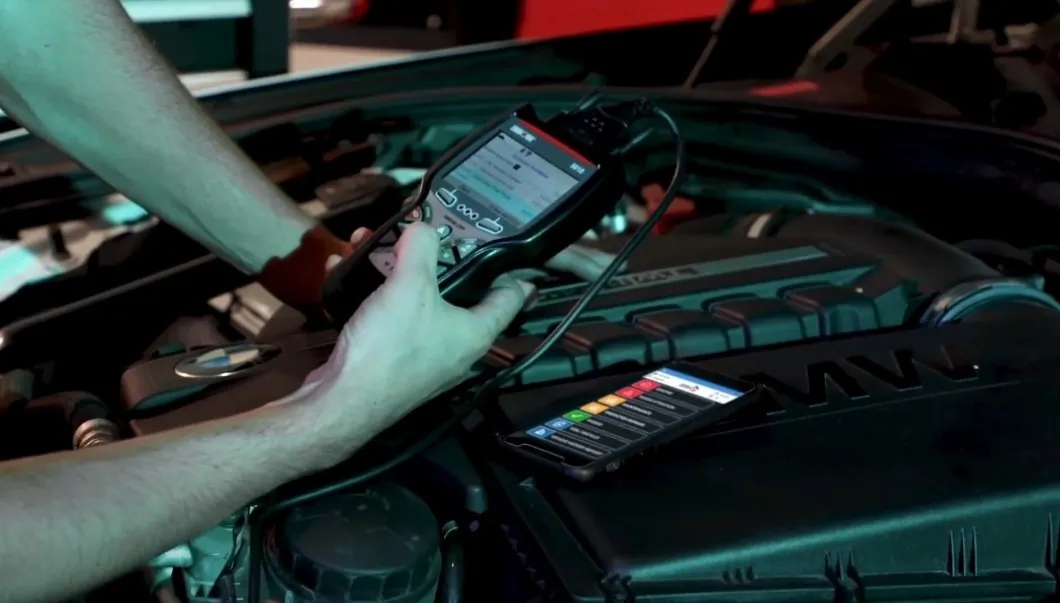 Person using OBD2 scanner on his car