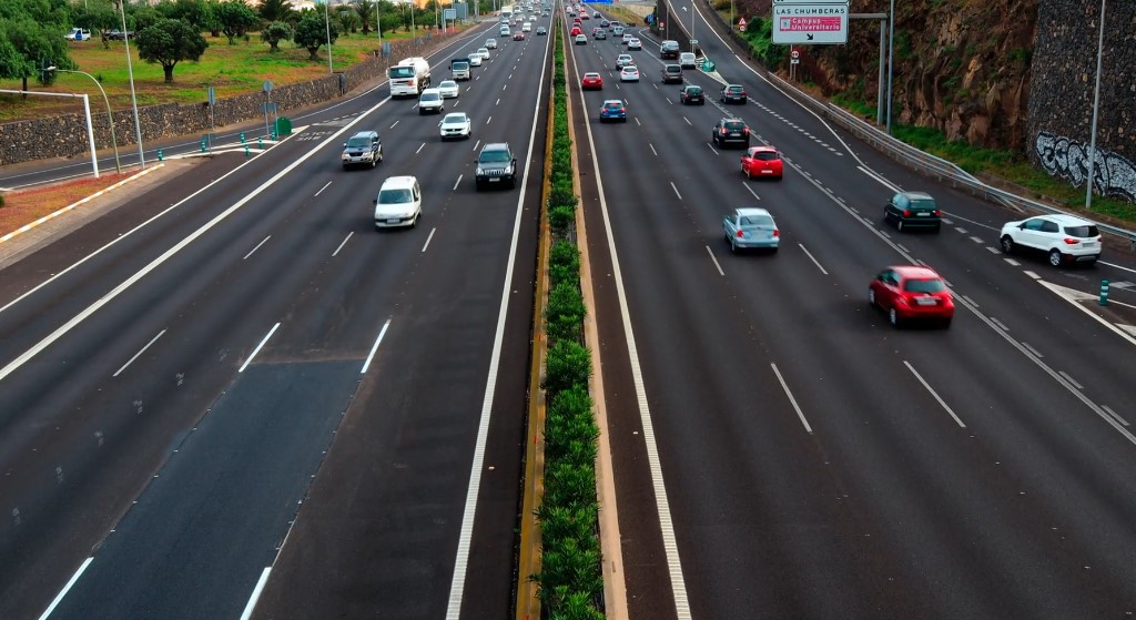 Aerial view of a highway full of cars