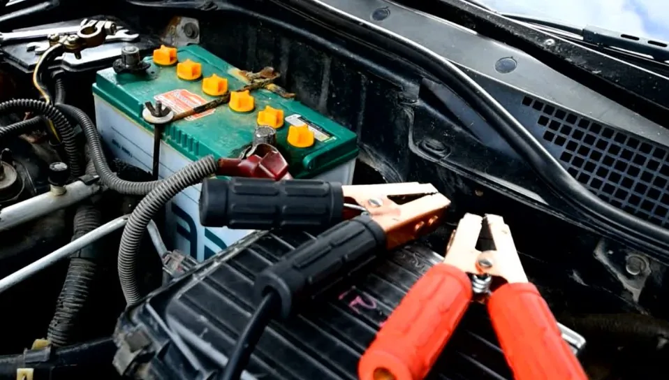 Car battery and jumper cables, ready for a jump start