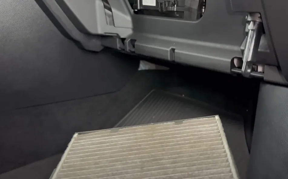 Change of cabin air filter in the process
