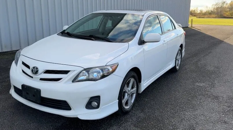 White Toyota Corolla, close up view