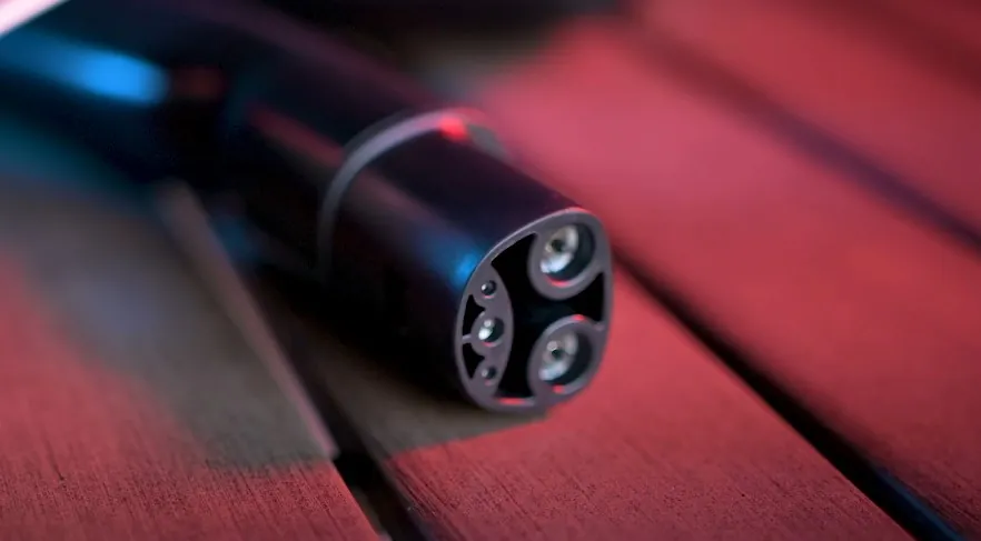 Close-up of a modern electric vehicle charging connector