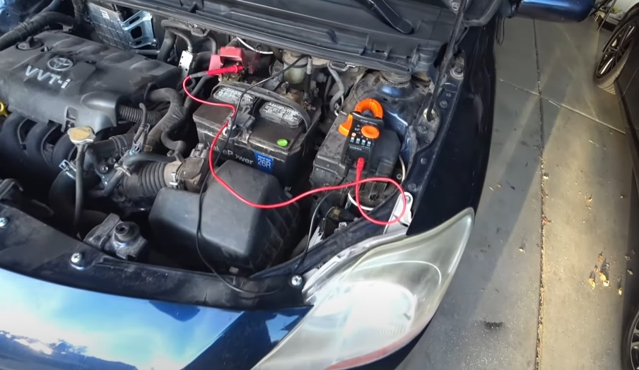 Close up view of a car's engine bay under the hood