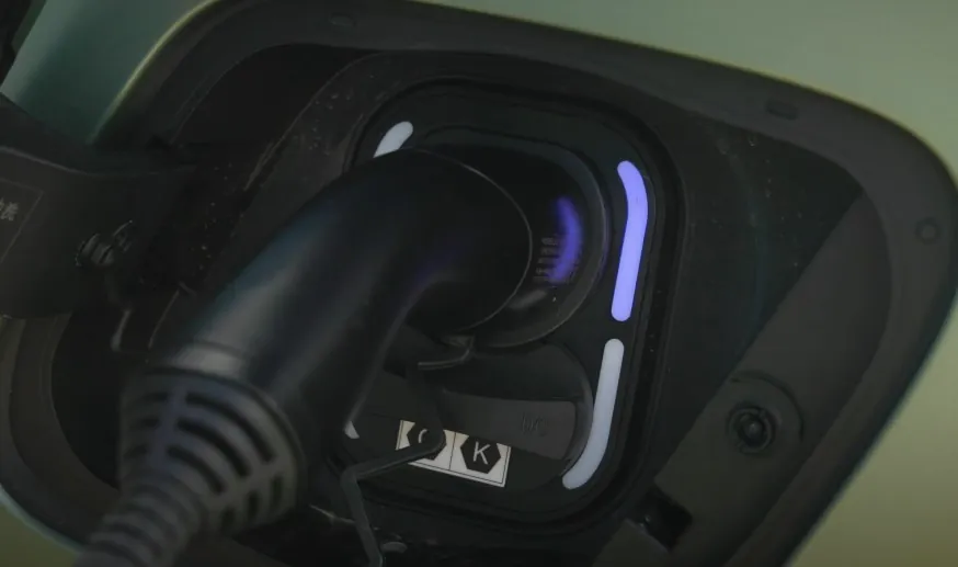 Close-up of an electric vehicle charging port