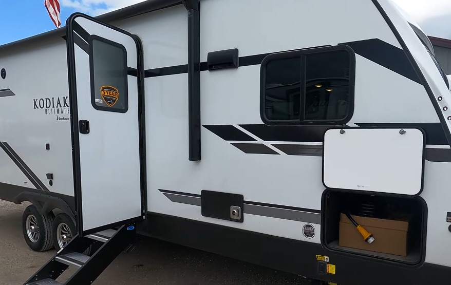 Close up view of a white Dutchman RV
