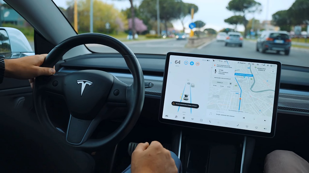 Tesla Model 3 interior with touchscreen navigation, symbolizing the incentive window tied to federal tax credits and promotions