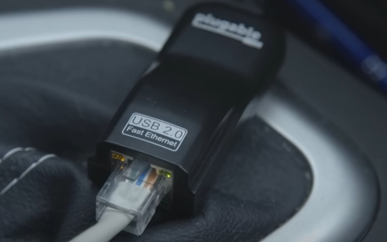 Close up of an ethernet cable in a USB adapter