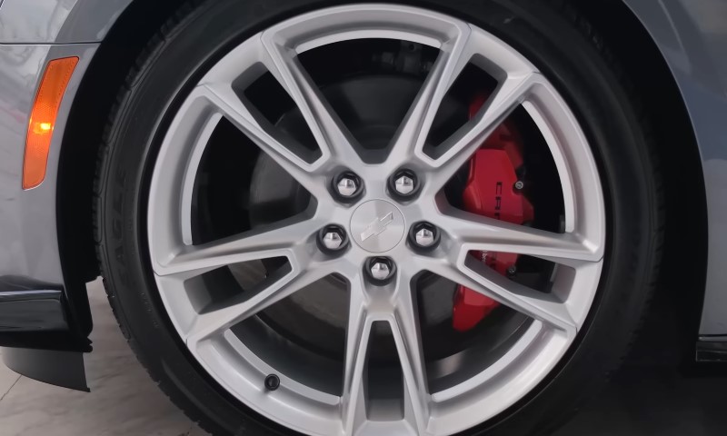 Close up view of a bolt pattern on Chevy Camaro wheel