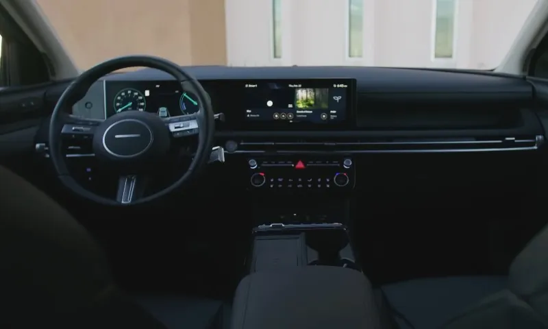 Interior view of a car showcasing the dashboard and steering wheel