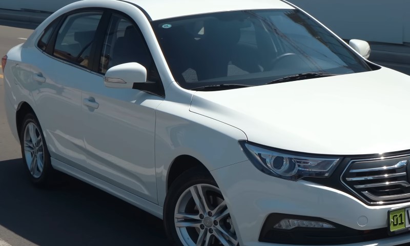 White FAW-Besturn-B30 car on the road