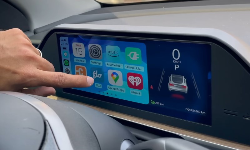 Tesla's new car dashboard features a sleek modern touchscreen interface for enhanced user experience and control