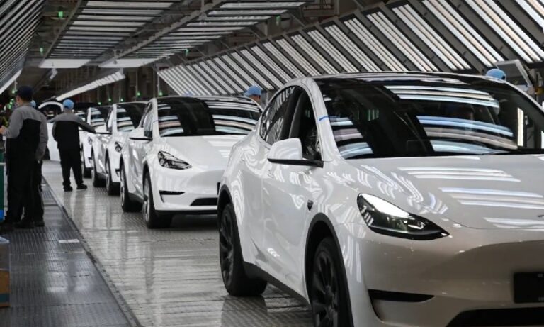 Assembly line with white electric cars