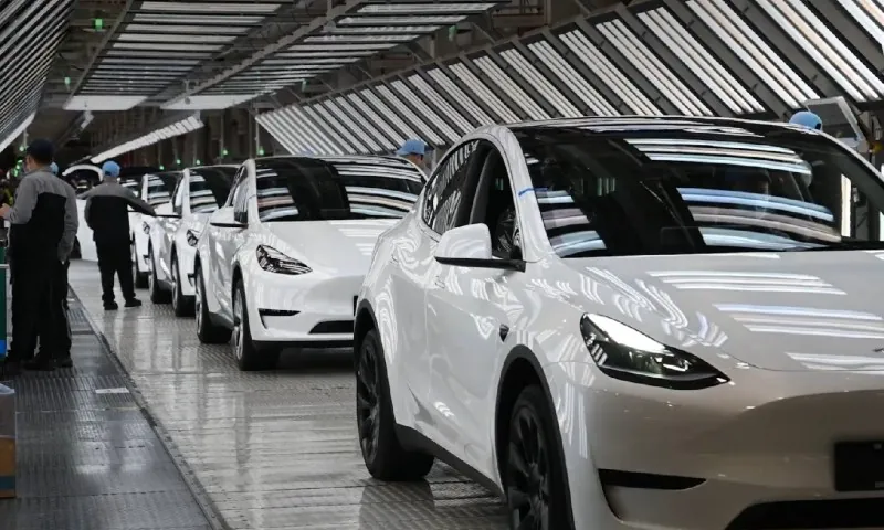Assembly line with white electric cars